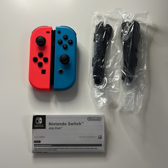 Nintendo Switch Joy Con Neon Pink/Neon Blue - Picture 3 of 3